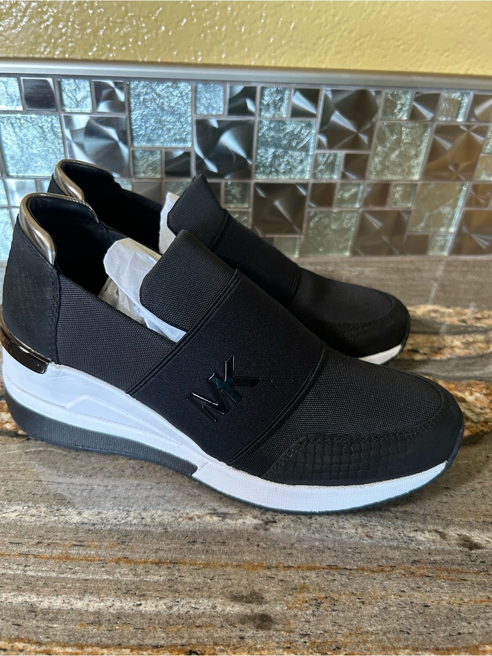 Michael Kors Black and White Slip-On MK Logo Sneakers